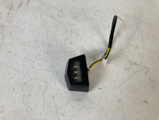 ILUM. TRASERA  HUSQVARNA